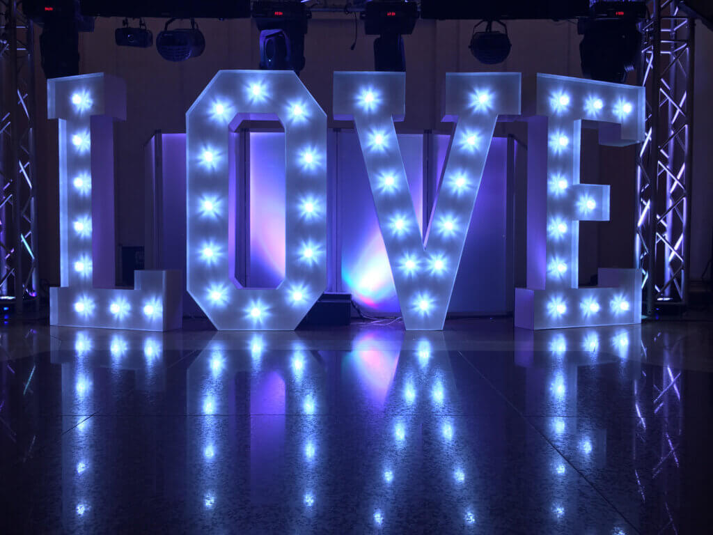 An illuminated "Love" sign